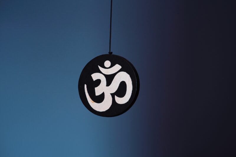 What Does the Om Symbol in Yoga Mean? Origins and History of Aum